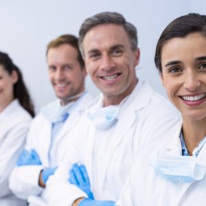 smiling-dentists-standing-with-arms-crossed.jpg